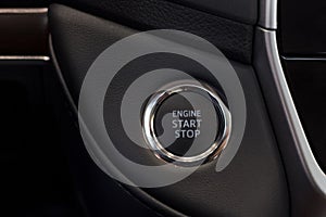 Car engine start and stop button. Modern and prestigious vehicles.
