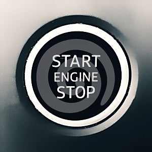 A car engine stop and start button