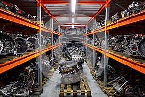 Car engines and gearboxes are on shelves