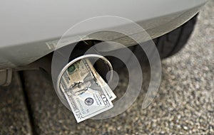 car, exhaust pipe and money