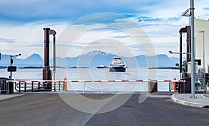 Car ferry crossing Fjord in Norway