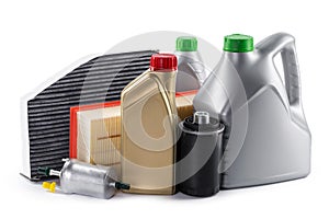 Car filters and motor oil can isolated on white