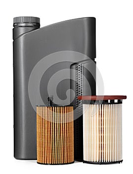 Car filters and motor oil can isolated on white