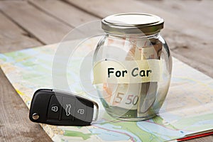 Car finance concept - money glass with word For car