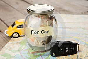 Car finance concept - money glass with word For car