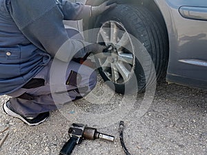 Car flat tire change replace on the road problem emergency