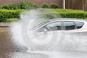 Car in flooded street