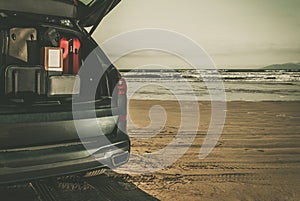 Car Full of Luggages on a Beach Summer Vacation Getaway Concept