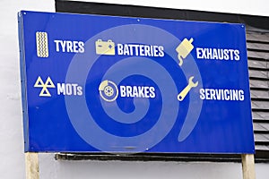 Car garage for tyres batteries exhausts MOTs brakes and servicing photo