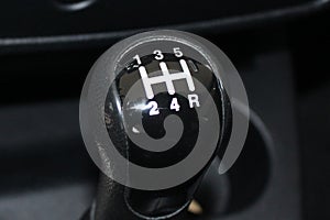 Car gear lever. Manual shift gear. Car gear shift stick.