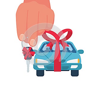 Car gift concept. Man holding in hand key with red ribbon and bow.