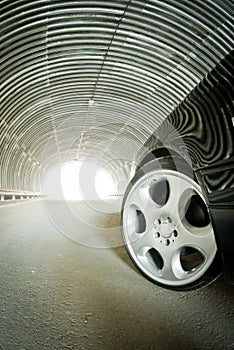 The car goes on light in a tunnel photo