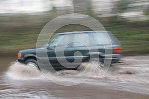 Car Going Through Flood