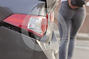 car has dented rear bumper damaged after accident