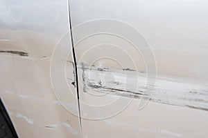 Car have scratched with deep damage to the paint,car accident on