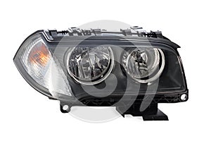 Car headlight on white background. Auto parts.