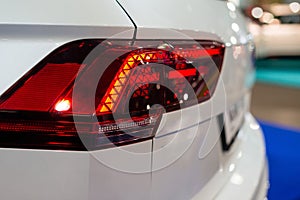 Car headlight with backlight. Exterior detail.White color car