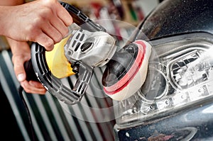 Car headlight cleaning with power buffer machine