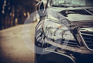 Car headlights. Exterior closeup detail