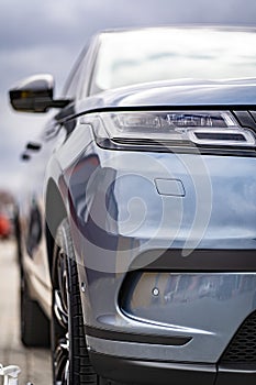 Car headlights. Exterior closeup detail. Car detail