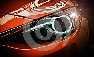 Car headlights. Exterior detail. Car luxury concept