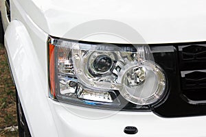 Car headlights. Luxury Headlights. Car. White car