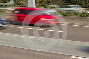 Car on highway in motion blur