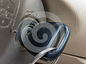 Car ignition switch with key inserted in it
