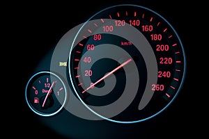 Car instrument panel, dashboard closeup with visible speedometer and fuel level. Modern car interior details.