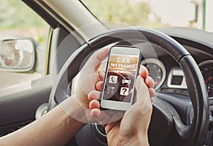 Car insurance concept, person driver reading website on smartphone