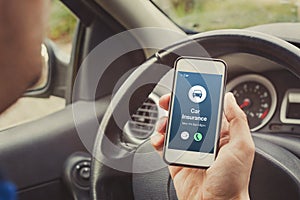 car insurance concept on phone screen, call road assistance