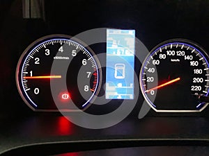 the speedometer of the car that lights up to indicate the speed of the car speed