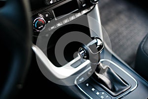 Car interior. Automatic transmission gear shift