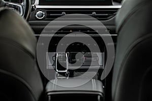 Car interior console close up view.