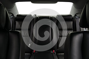 Car interior detail. Leather passenger rear seats.