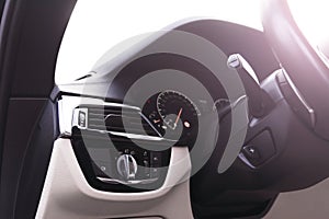 Car interior with light switch. The light knob in the car. Multifunction headlight console control switch. Turn on-off headlightCa