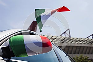 Car with Italy flags closeup