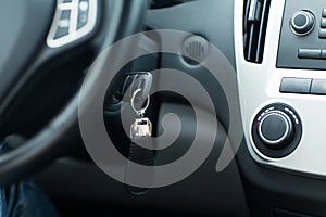 Car key in ignition start lock photo