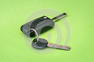 Car key isolated on green