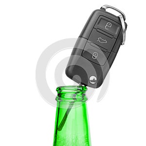 Car key in neck of bottle of bee