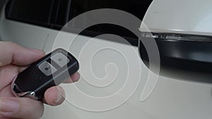 Car key remote control. Locking and unlocking the car by the car key remote control