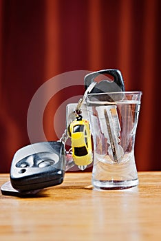 Car key and wodka glass