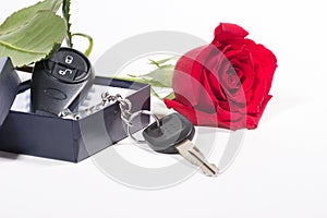 Car keys and beautiful rose