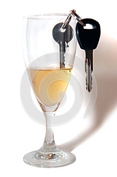Car keys inside champagne flute