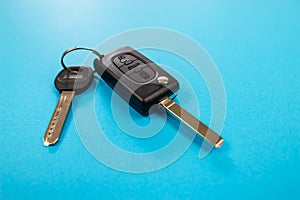 Car keys isolated on blue