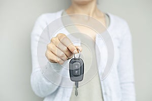 Car Keys. Seller hand giving keys