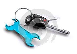 Car keys with spanner icon keyring. Concept for vehicle maintenance and servicing plan.