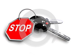 Car keys with stop road sign on keyring.