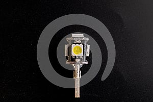 Car light bulb emitting diode, accessories and components for electronics vehicles. copy space. Black background close-up. 12V T10