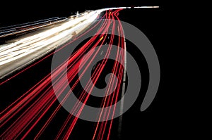 Car light lines on a highway during trafic jam at night